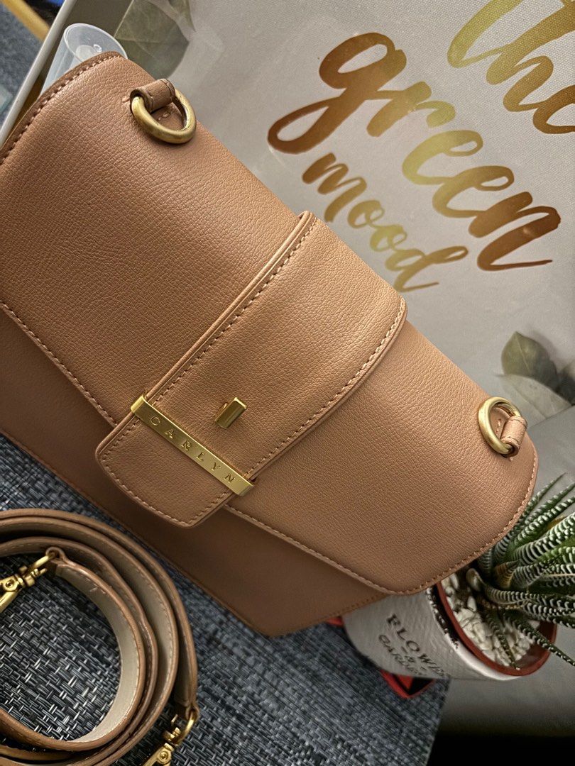 Preloved Original Carlyn - sling bag (Category: Luxury Bags & Wallets) located in Cavite. Submitted by Vjewel (Listing ID 1363325102, Image 3). Description: ✅ preloved but in excellent condition ✅ with normal signs of use only ( see last pics posted) ✅ nude pink/beige .