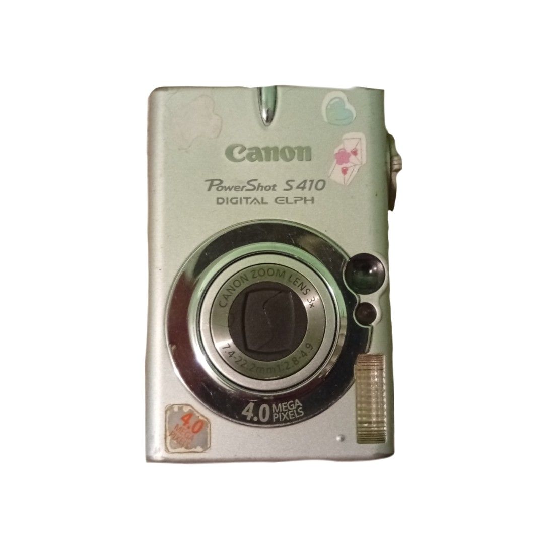 canon powershot s410 digital elph 2004 (Category: Cameras) located in Daet. Submitted by 6sinchedforthegods9 (Listing ID 1363295150, Image 1). Description: — details ❄️ -working flash — inclusions -camera -2 batteries -charger -tf card transfer — issues 🫧 -some buttons doesnt wok -battery cover needs tape - black screen (can be opened, able to see the intro part, but when its time to take pic, the screen is black.) LCD NEEDS TO BE REPLACED/REPAI