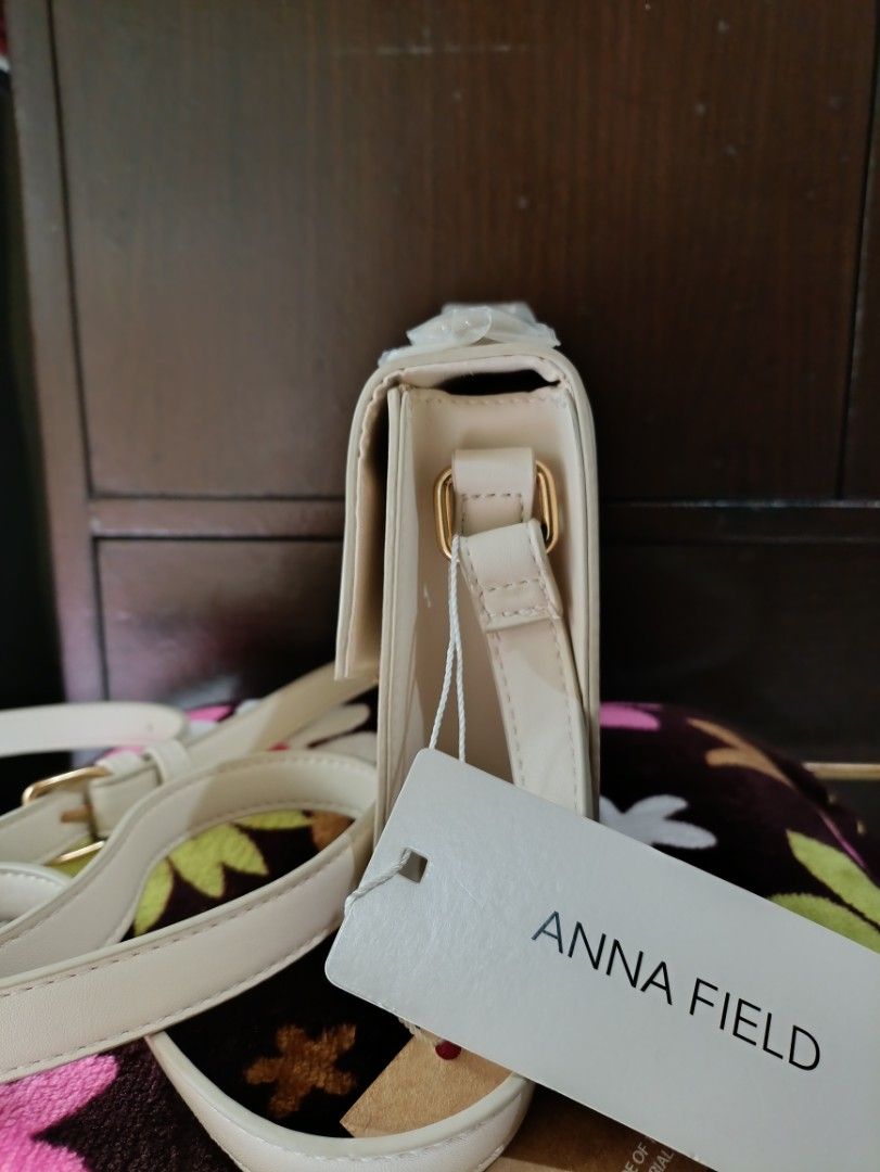 Anna Field Sling Bag/Shoulder Bag - off white (Category: Shoulder Bags) located in Manila. Submitted by reusemnl (Listing ID 1363365083, Image 2). Description: - Used thrice for a total of 18 hours approx. - Black stains on the lining inside were due to my black wallet. See last photo. ✔ Strictly cashless transactions only whether pick-up or meet-up. Shipping costs to be shouldered by buyer..