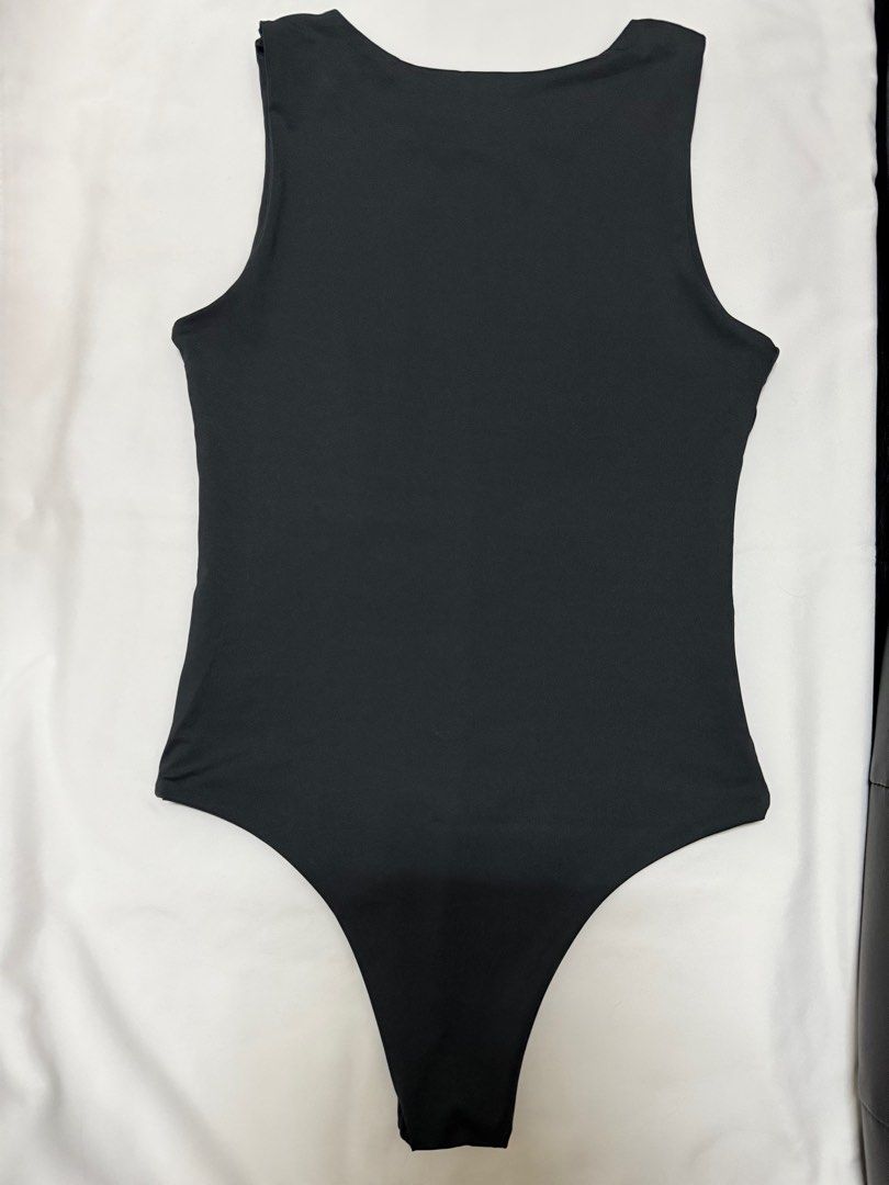Dilag the Label Fitted Sleeveless Bodysuit (Category: Sleeveless) located in Manila. Submitted by swift.thrift (Listing ID 1363452847, Image 2). Description: Dilag the Label Fitted Sleeveless Bodysuit in size medium, color black. .