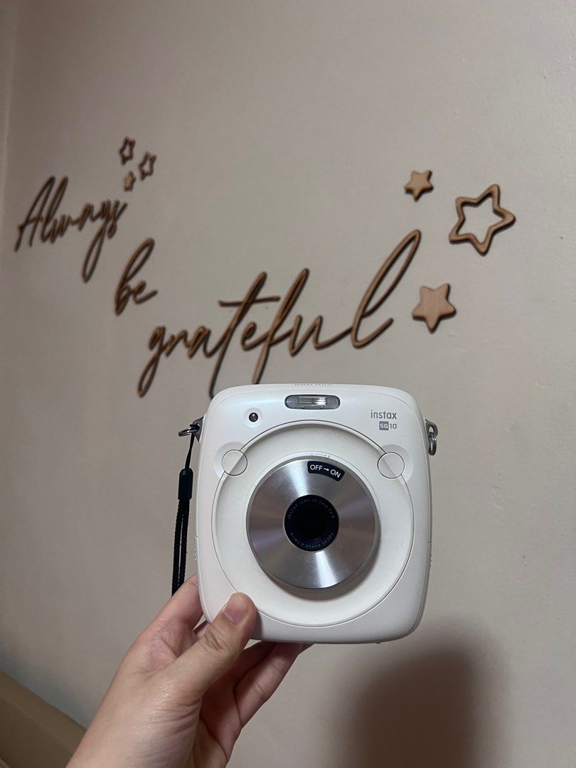 Instax Square (SQ 10) (Category: Cameras) located in Valenzuela. Submitted by trinidad.edna (Listing ID 1363404672, Image 1). Description: Instax SQ 10 Hybrid — can get digital copies of your photos, can edit before print Lightly used Still with box, original receipt, camera bag, and 1 box of film Rfs: decluttering.