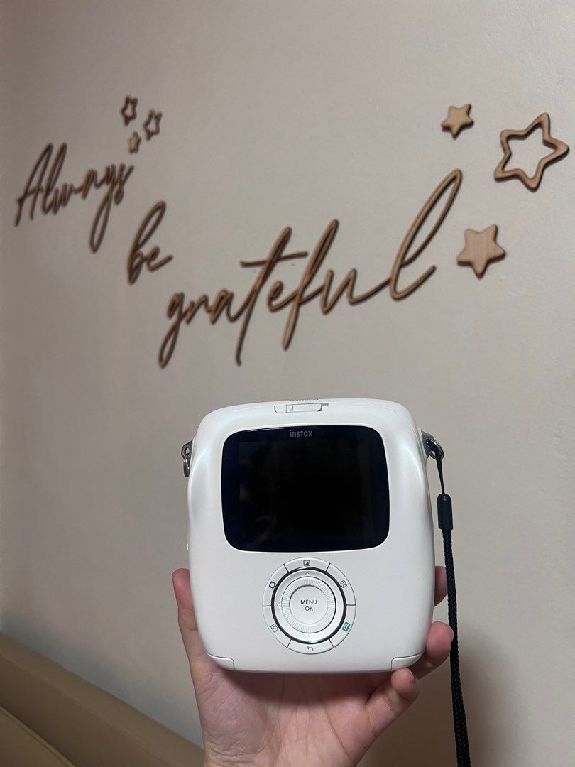 Instax Square (SQ 10) (Category: Cameras) located in Valenzuela. Submitted by trinidad.edna (Listing ID 1363404672, Image 2). Description: Instax SQ 10 Hybrid — can get digital copies of your photos, can edit before print Lightly used Still with box, original receipt, camera bag, and 1 box of film Rfs: decluttering.
