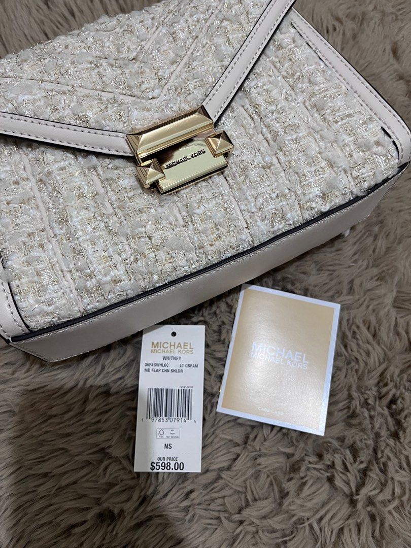 MK whitney tweed 2 way bag (Category: Luxury Bags & Wallets) located in San Isidro. Submitted by saj10 (Listing ID 1363412484, Image 3). Description: Guaranteed original Color: cream/tweed Can be worn as shoulder or crossbody Orig price at 598usd + tax , still retails at 20k+ .