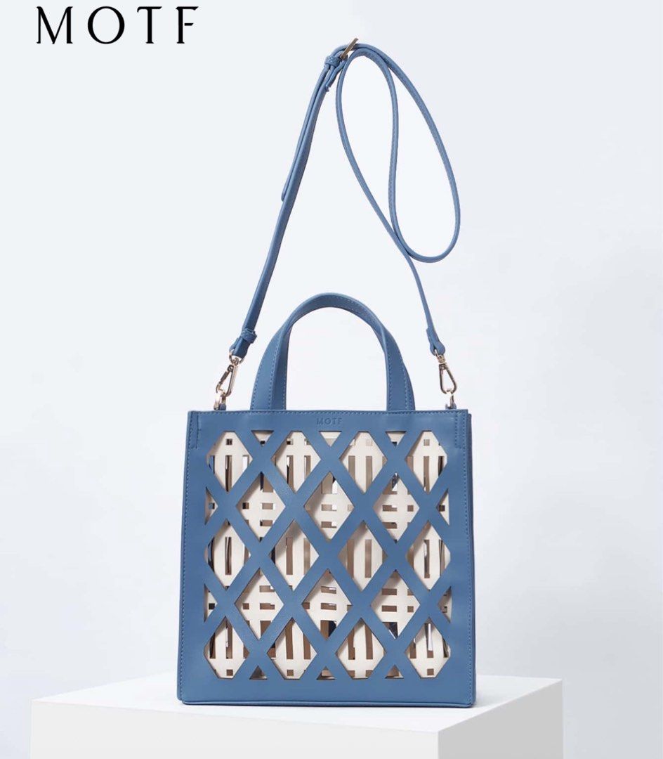MOTF two tone hollow out square bag (Category: Cross-body Bags) located in Makati City. Submitted by jinger_21 (Listing ID 1363452970, Image 2). Description: Preowned Excellent condition Two toned (blue and white) With long strap Fixed price - Php 500 plus SF Payment options: Gcash Maya RCBC diskartech Chinabank.