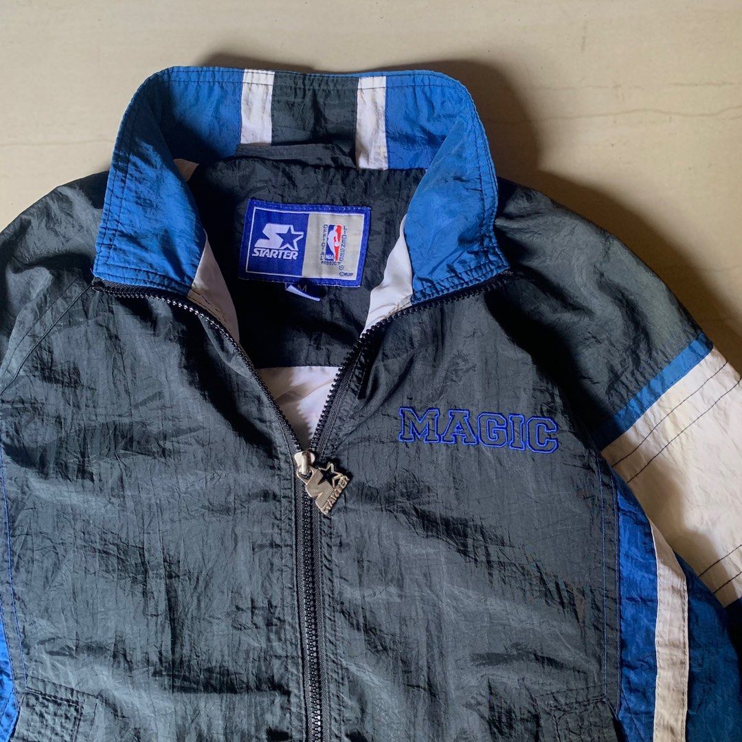 Orlando Magic Starter Jacket (Category: Coats, Jackets and Outerwear) located in Cebu City. Submitted by looted.goods (Listing ID 1363430144, Image 2). Description: Orlando Magic Starter Jacket Excellent condition Color rate: 9.5/10 20.5x22 Issue: scratches DM FOR MORE DETAILS.