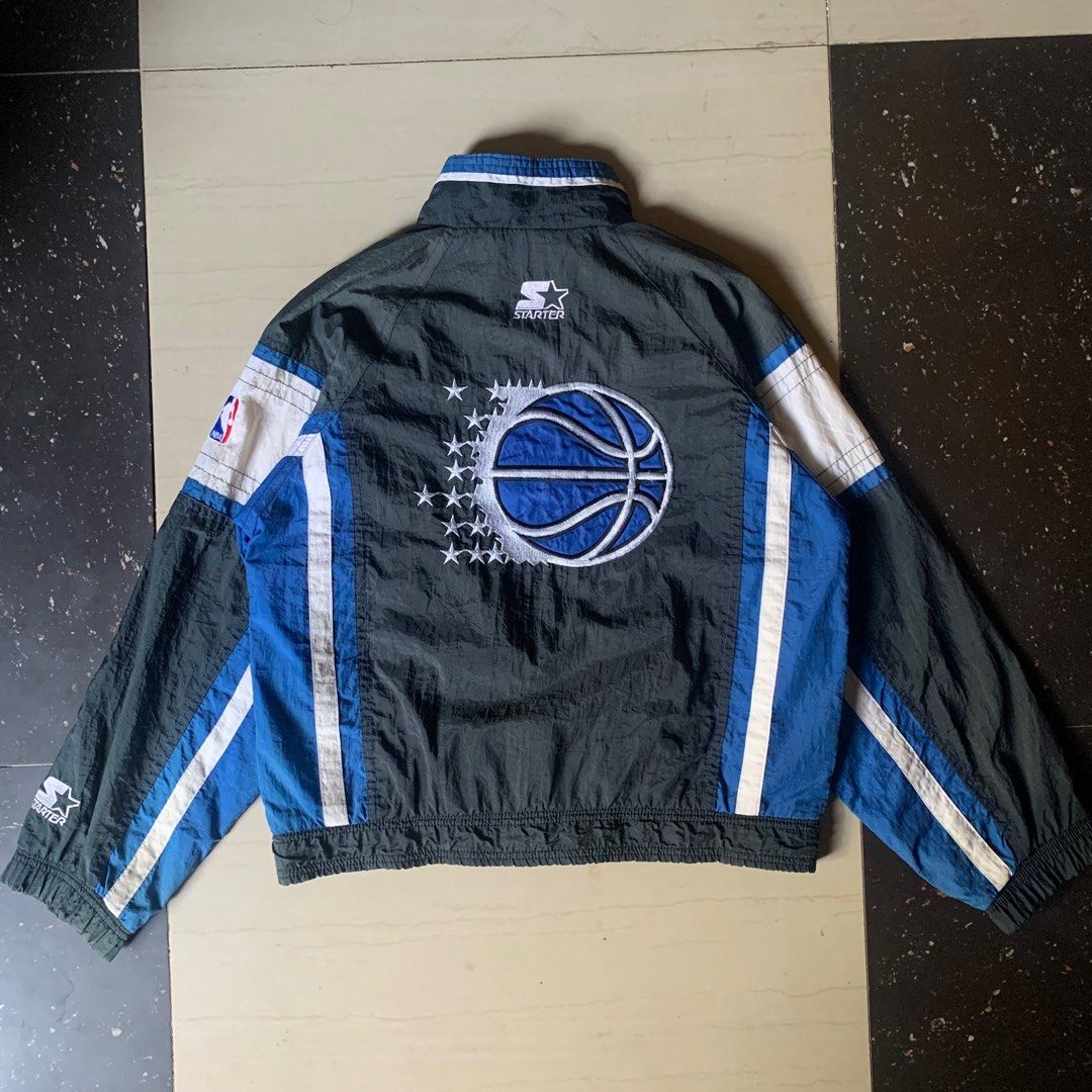 Orlando Magic Starter Jacket (Category: Coats, Jackets and Outerwear) located in Cebu City. Submitted by looted.goods (Listing ID 1363430144, Image 3). Description: Orlando Magic Starter Jacket Excellent condition Color rate: 9.5/10 20.5x22 Issue: scratches DM FOR MORE DETAILS.