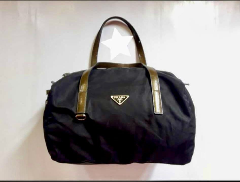 Prada Tessuto Nylon Boston bag (Category: Luxury Bags & Wallets) located in Quezon City. Submitted by maismaria (Listing ID 1363477161, Image 1). Description: Authentic Condition 9/10 Silver hardware RFS No longer being used .