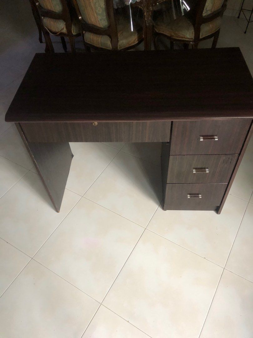 Study table (Category: Tables & Sets) located in Singapore. Submitted by user162473196 (Listing ID 1363436193, Image 3). Description: URGENT Small defect at the side but still in great shape.