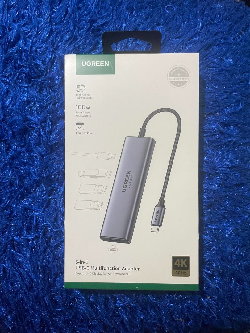 UGREEN 5-in-1 USB-C Adapter (Category: Cables & Adaptors) located in Makati City. Submitted by techno-shop (Listing ID 1363461485, Image 1). Description: Features: ● Brand: Ugreen ● Input : Type C ● Output: 2 x USB3.0; HDMI port; SD/TF slot ● HDMI Resolution up to 4K*2K/60Hz ● USB 3.0 standard Transfer speed up to 5Gbps Backward compatibility USB 2.0/1.1 ● USB-C PD 100W power supply port.