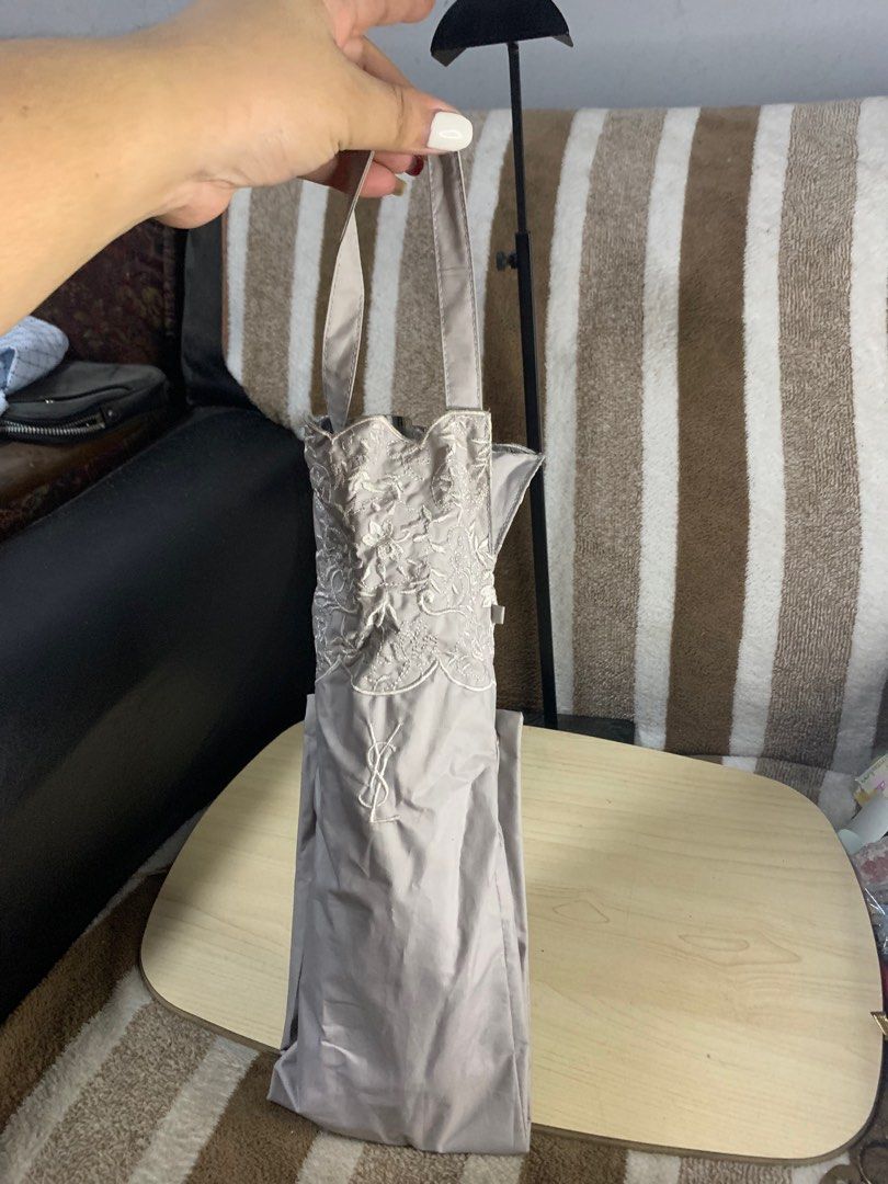 Auth YSL vintage folded umbrella (Category: Umbrellas) located in Cabanatuan. Submitted by mjluxxejapan (Listing ID 1363540206, Image 2). Description: Fixed price. Gandaa nto makapal matibay nylon material like new cond light gray color .