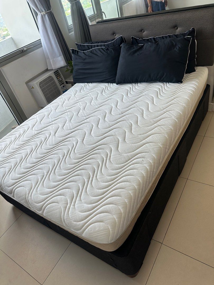 Mattress for sale (Category: Bed Frames & Mattresses) located in Quezon City. Submitted by pjrosetase (Listing ID 1363585160, Image 2). Description: Double-Size Bed with Frame and Mattress Description: - Double-size bed with sturdy frame and padded headboard - high quality 8-inch mattress - Wooden bed base with drawers for storage Condition: - Gently used for only 4 months by tenants - Purchased in June 2024, relatively new and well-maintained co