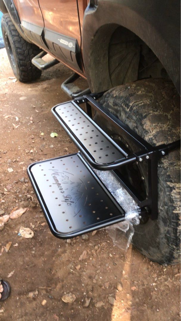 Camping Folding Tire Wheel Mounted Table Step, Large Weight Capacity Stable (Category: Other Automotive Parts and Accessories) located in Cainta. Submitted by janilen (Listing ID 1363547009, Image 2). Description: Heavy duty two layer All steel. Adjustable. Easy to use Best for camping. Can be use as step ladder. With easy carry bag. On hand. Can be delivered via lalamove. (Shouldered by the buyer).
