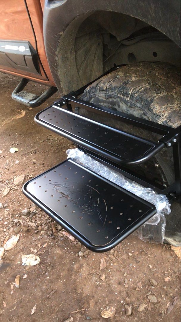 Camping Folding Tire Wheel Mounted Table Step, Large Weight Capacity Stable (Category: Other Automotive Parts and Accessories) located in Cainta. Submitted by janilen (Listing ID 1363547009, Image 1). Description: Heavy duty two layer All steel. Adjustable. Easy to use Best for camping. Can be use as step ladder. With easy carry bag. On hand. Can be delivered via lalamove. (Shouldered by the buyer).