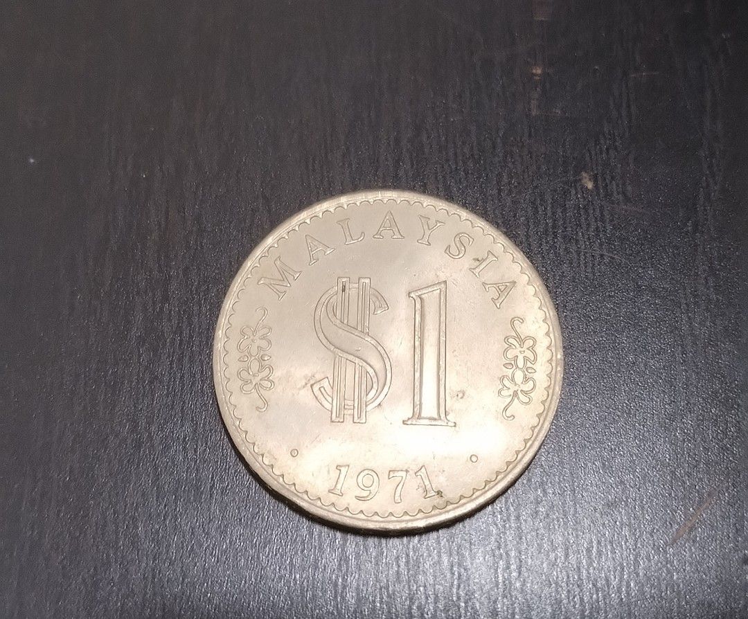 Coin 1 ringgit (Category: Currency) located in Kuala Lumpur. Submitted by rthomas22 (Listing ID 1363636414, Image 1). Description: One ringgit coin 1971..price negotiable.