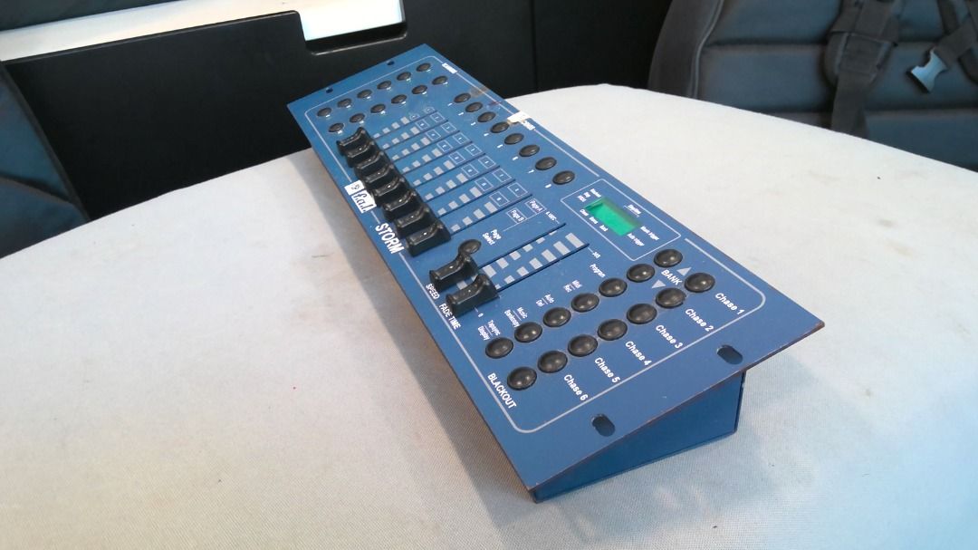 DMX Controller (Category: Lighting & Studio Equipment) located in Singapore. Submitted by prod00592 (Listing ID 1363612533, Image 3). Description: 8 sliders for control (page A/B) 8 programmable scenes in 30 banks 6 chases Input Voltage: DC 12V, 300 mA min .