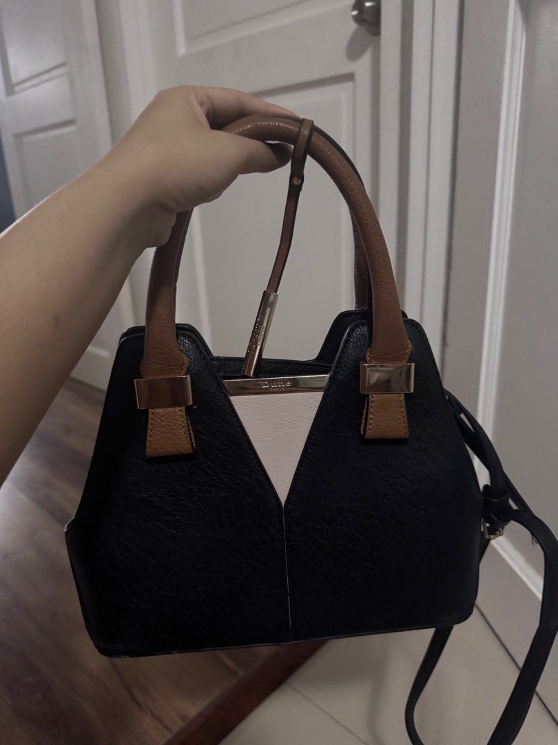 Dune London black bag (Category: Luxury Bags & Wallets) located in Taguig. Submitted by nikki.mnl (Listing ID 1363634479, Image 1). Description: .