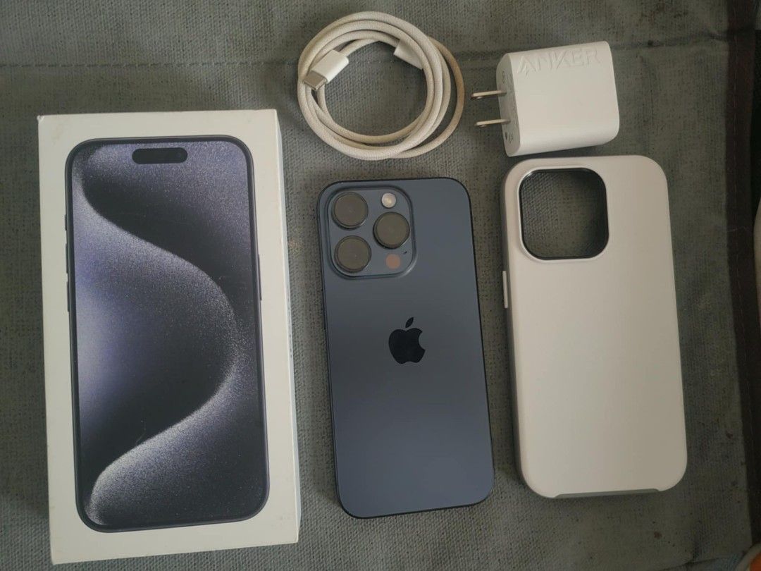 Iphone 15 Pro Blue titanium 256 (Category: iPhone 15 Series) located in Makati City. Submitted by madvillainkicks (Listing ID 1363644260, Image 2). Description: Iphone 15 Pro 256gb 90% batt health No dents No scratches Globe locked Blue titanium White otterbox case Anker 20 watts charger Orig charger cable Php 50k - slightly nego.