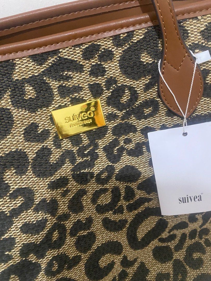 Leopard Print Bag (Category: Tote Bags) located in Leyte. Submitted by declutterthis__ (Listing ID 1363686109, Image 2). Description: Brand New with tags. Perfect for work or school Fashion brand but good quality and nice stitches. PM for more photos..
