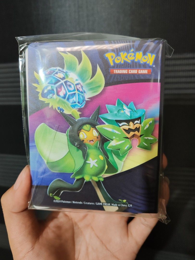 Pokemon Surging Sparks - Mini Portfolio (Category: Raw Singles) located in Marilao. Submitted by komar03 (Listing ID 1363612844, Image 2). Description: Sealed Loc: Bulacan Shipping: Lalamove, LBC.