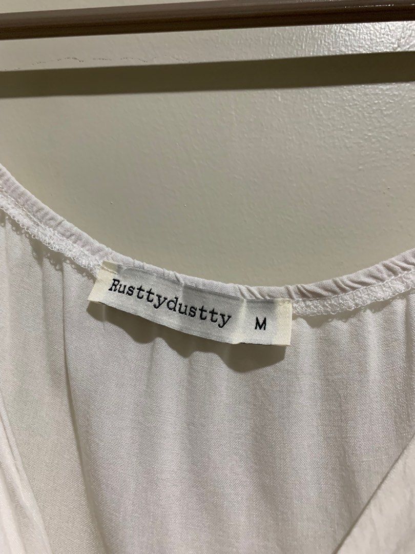 White Tie Front Blouse (Category: Blouses) located in Iloilo. Submitted by lex.declutters (Listing ID 1363668000, Image 3). Description: still in good condition 👚 medium on the tag but can fit my L-XL frame (tight on the bust area though) RFS: decluttering .