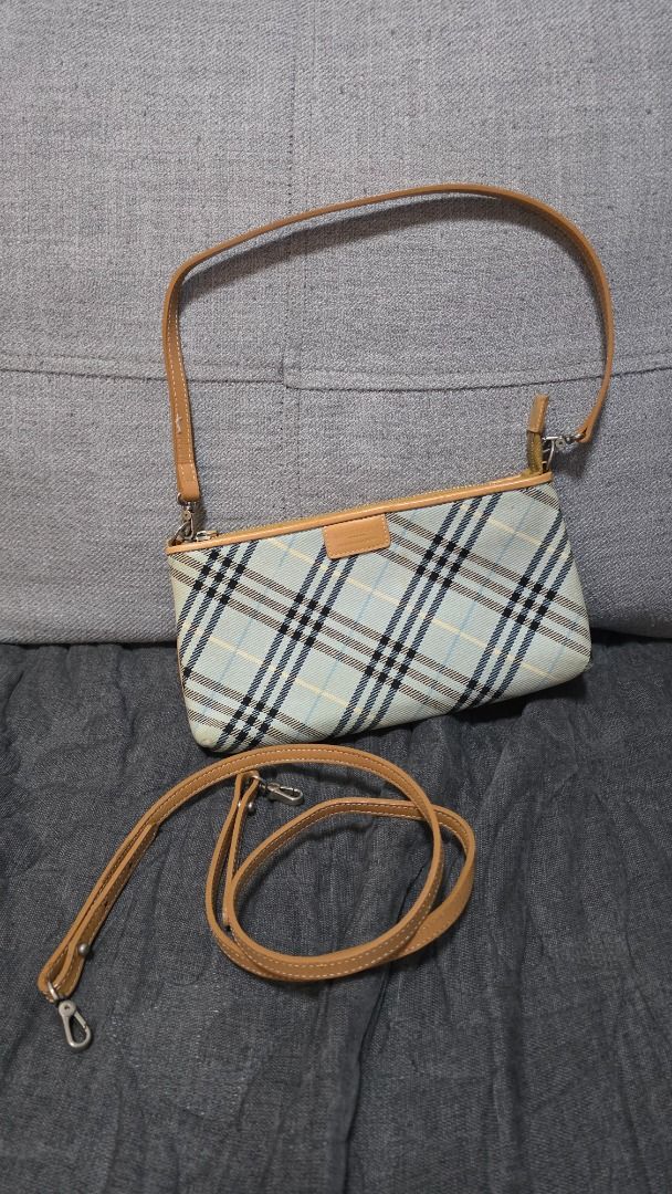 Burberry Blue Label Pochette (Category: Luxury Bags & Wallets) located in Manila. Submitted by mommypracticalityshop (Listing ID 1363796463, Image 1). Description: 💯 Authentic BB 2 straps, for kili bag and sling bag Clean interior and exterior With provided dustbag .