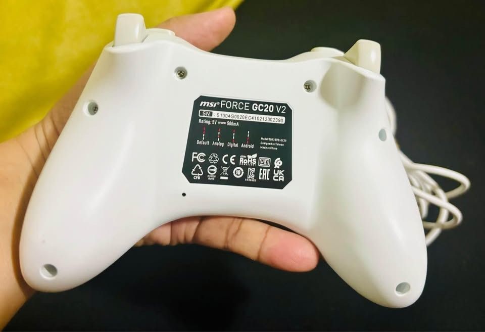 FORCE GC20 V2 GAMING CONTROLLER (Category: Controllers) located in Las Pinas. Submitted by stuffytea (Listing ID 1363792505, Image 2). Description: NEGOTIABLE !!! MODEL NAME: FORCE GC20 V2 GAMING CONTROLLER INTERFACE: USB 2.0 COMPATIBLE OS: Windows 10/8.1/8/7, Android 4.1 and above ACCESSORIES: Additional D-PAD Cover PRODUCT DIMENSIONS (MM): 156 x 105 x 62.5 WEIGHT (PRODUCT / PACKAGE): 205g / 398g FEATURES ‧ Support PC and Android ‧ Dual Vibratio