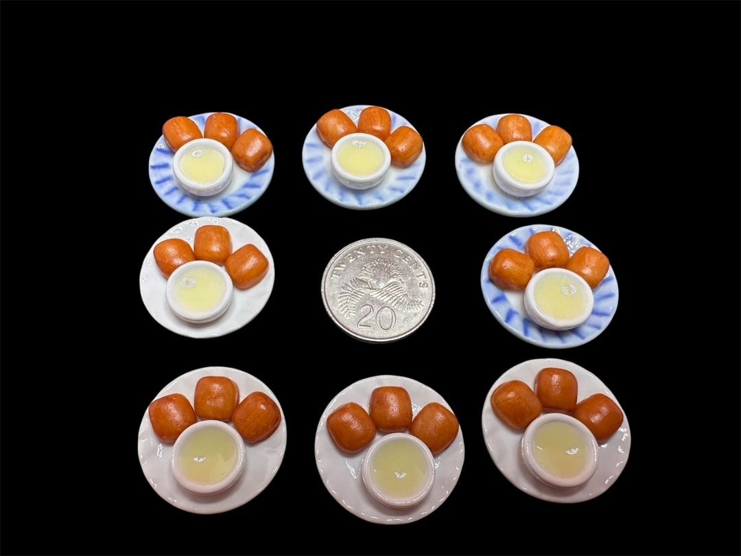 Handmade Miniature Fried Mantou with Condensed Milk, Clay, 炸馒头 ,Clay, 1 set (Category: Handmade Craft) located in Singapore. Submitted by mini.collectibles.1 (Listing ID 1363745183, Image 2). Description: Handmade Miniature Fried Mantou with Condensed Milk, Clay, 炸馒头 ,Clay, 1 set Made from clay There may be some finger pressing stains or prints due to handmade. Miniature Showcase Display Store at the address below: Blk 2019 Bukit Batok St 23 (Ind