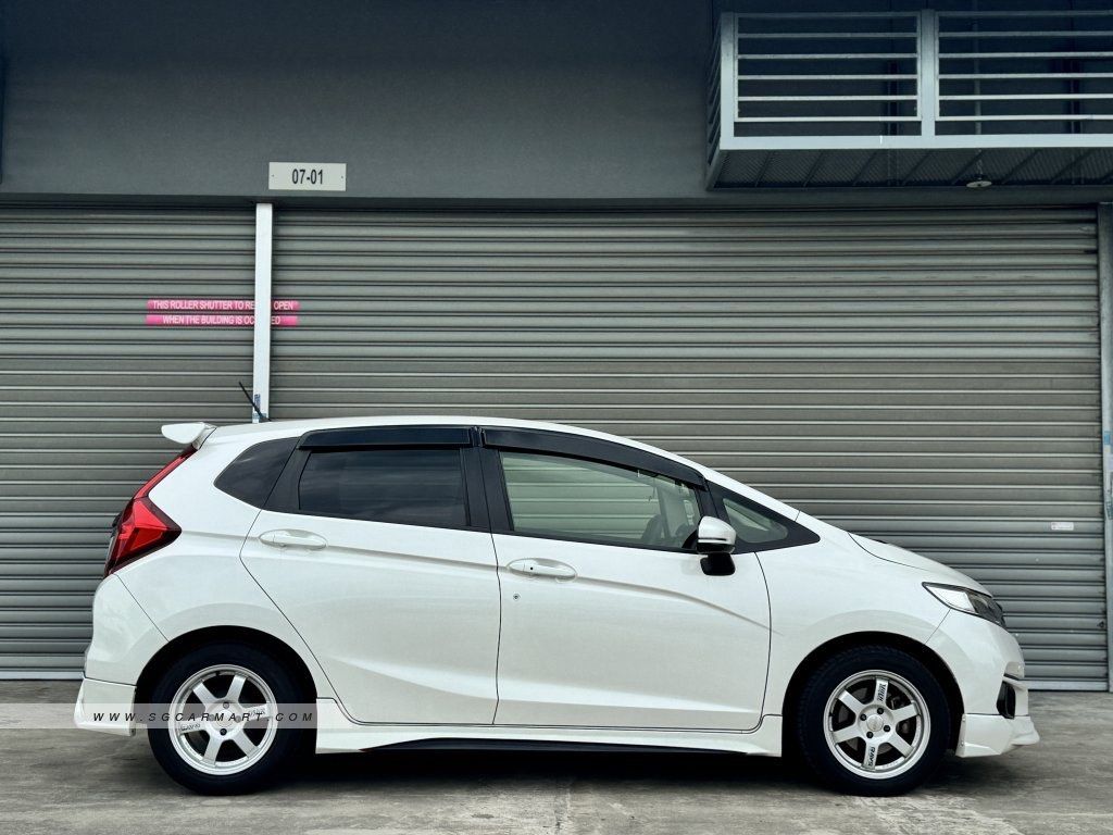Honda Fit 1.3 (A) (Category: Used Cars) located in Singapore. Submitted by 0driveawayauto (Listing ID 1363765677, Image 2). Description: 84440900 Clearance Price Honda Fit 1.3A Jul 2019 from $780 monthly mega promo!! Low mileage 🔥🔥🔥 Mega Promo!!! superb condition! Highest trade in! 🔥🔥🔥🔥🔥🔥🔥🔥🔥🔥🔥🔥🔥🔥🔥🔥🔥 Trusted dealer . Best package Guranteed . Interest rate from 1.68% . 10% downpayment mega promo PHV full loan $0 downpayment . $3