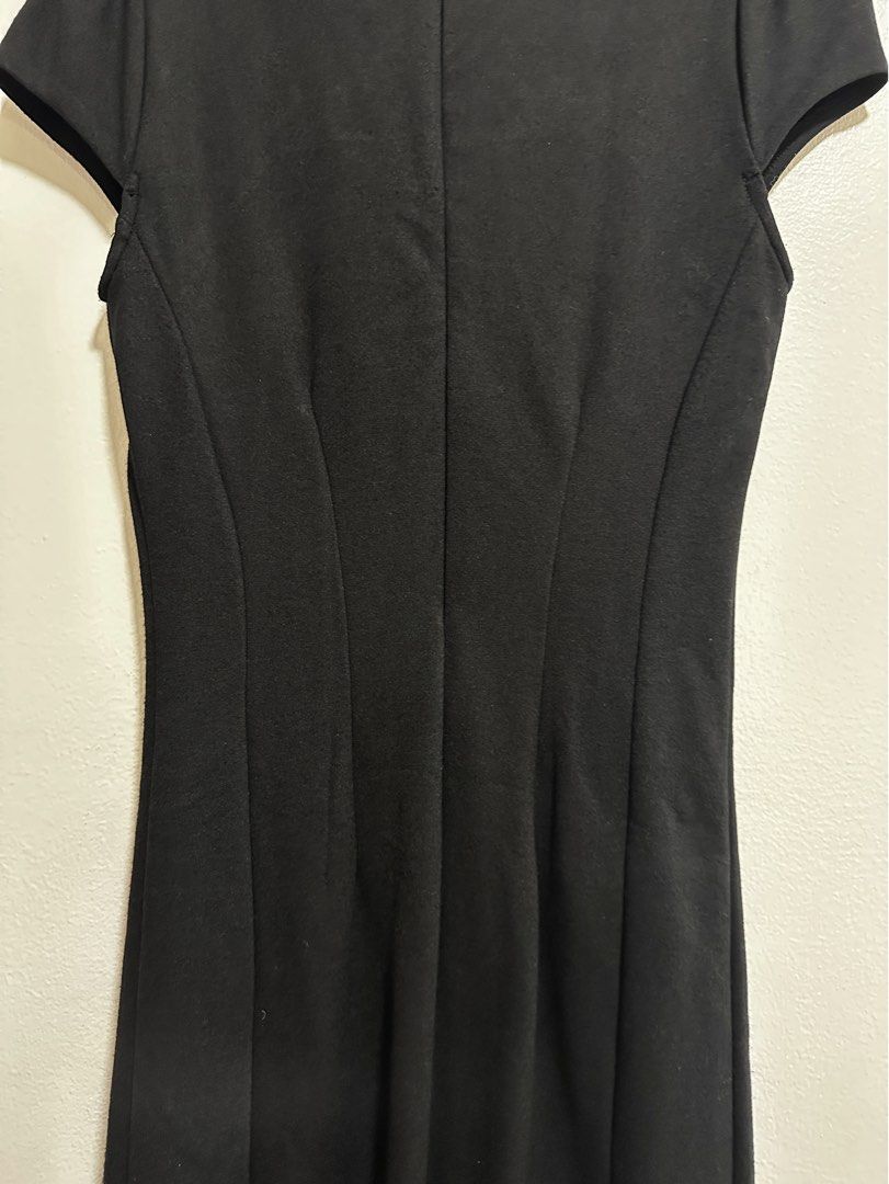 Mango Embellishment Black Dress (Category: Dresses) located in Makati City. Submitted by charm_style_items (Listing ID 1363788156, Image 3). Description: Brand: Mango • Size: XS • Color: Black • Style: Classic sheath dress • Details: • Eye-catching rhinestone embellishment on the neckline • Subtle puff sleeves • Sleek, curve-skimming silhouette • Concealed back zip closure • Condition: Excellent used condition • Perfect for: Office parties, cockt
