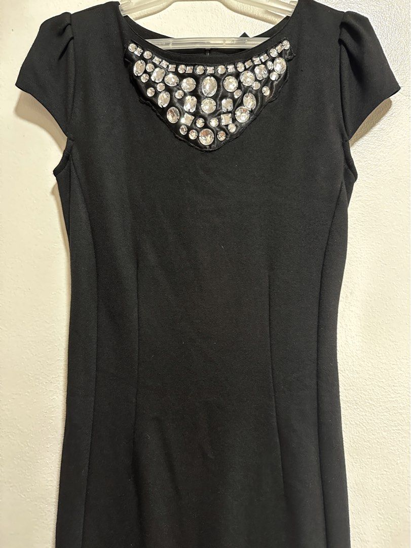 Mango Embellishment Black Dress (Category: Dresses) located in Makati City. Submitted by charm_style_items (Listing ID 1363788156, Image 2). Description: Brand: Mango • Size: XS • Color: Black • Style: Classic sheath dress • Details: • Eye-catching rhinestone embellishment on the neckline • Subtle puff sleeves • Sleek, curve-skimming silhouette • Concealed back zip closure • Condition: Excellent used condition • Perfect for: Office parties, cockt