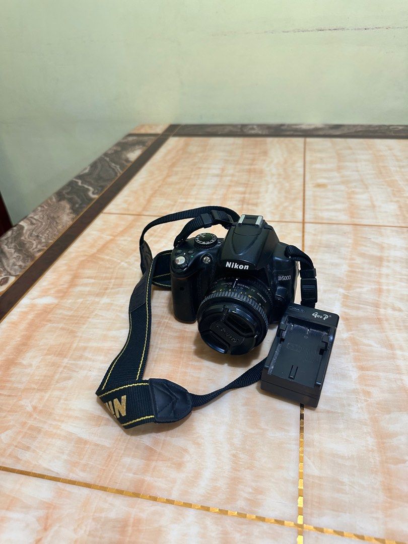 NIKON DSLR D5000 + 3 Lens (Category: Cameras) located in Malolos. Submitted by novida.julianne.7868 (Listing ID 1363866631, Image 1). Description: 3 lens with DSLR.