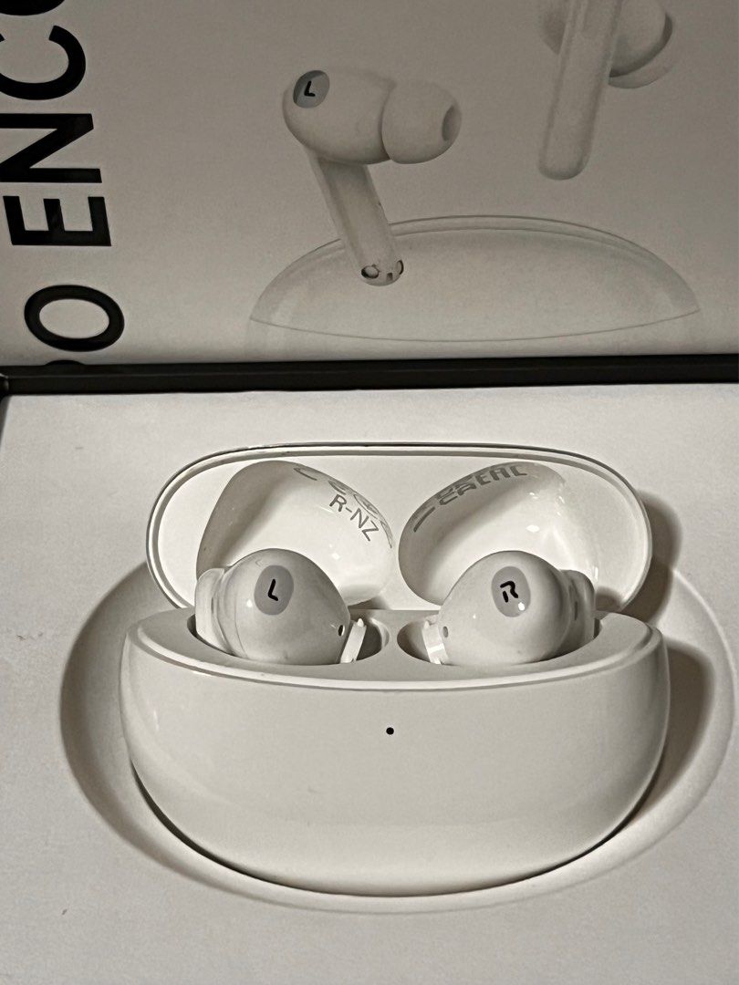 Oppo Enco Air2 Pro (Category: Earphones) located in Singapore. Submitted by ZhuoAnn (Listing ID 1363796882, Image 2). Description: OPPO ENCO with 2 new pair of earpiece rubber tips in box for hygiene purposes. Refractive bubble case 12.4 mm titanized diaphragm driver Active nolse cancellation Al noise cancellation for calls Up to 28 hours of listening time Binaural low-latency with Bluetooth® 5.2 transmission.