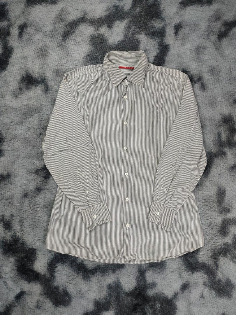 Prada stripes button up (Category: Formal Shirts) located in Muntinlupa City. Submitted by d_code (Listing ID 1363878006, Image 1). Description: 41 on tag excellent slightly damaged washtag legit 21.5 x 29.
