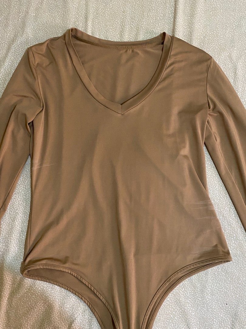 Shein Mocha Longsleeve Bodysuit (Category: Longsleeves) located in Makati City. Submitted by rfmmn (Listing ID 1363884682, Image 1). Description: RFS: Decluttering Di ko masiyadong nasusuot.