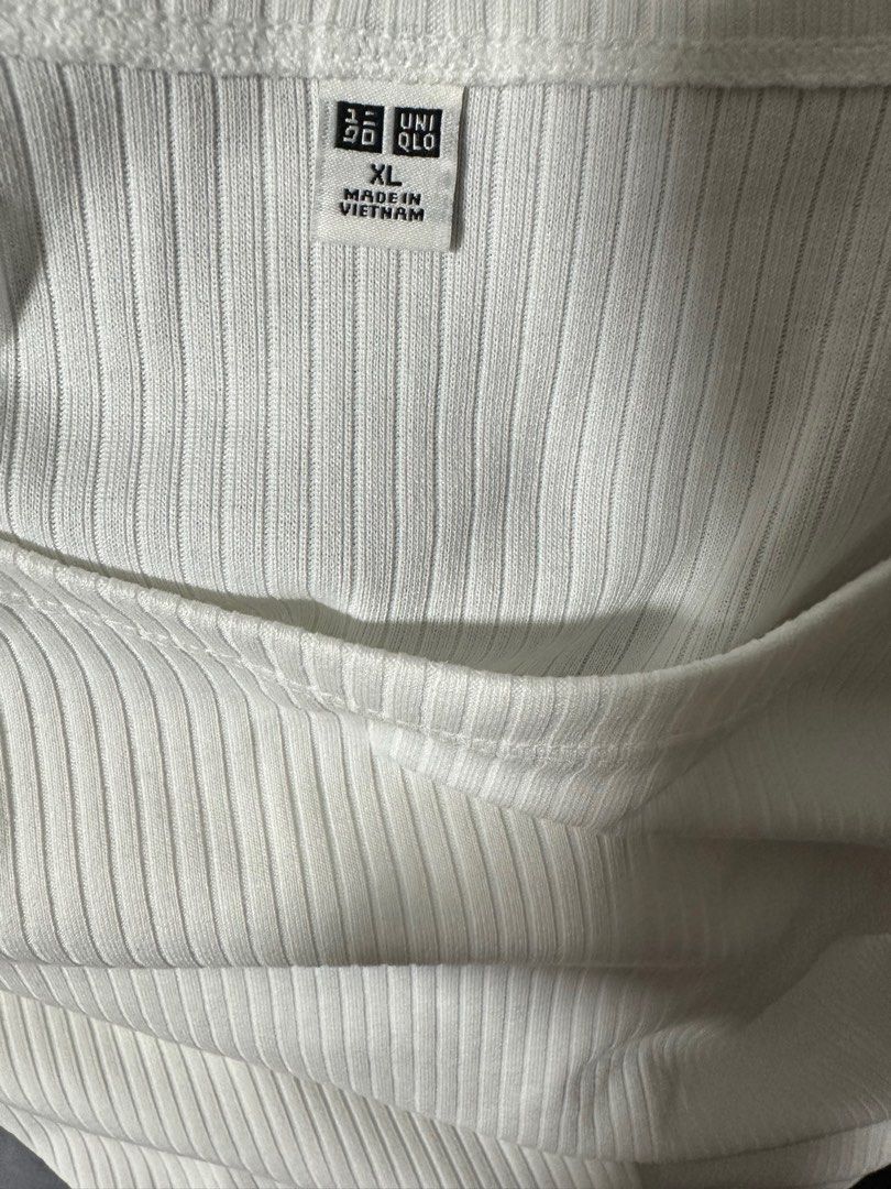 Unqilo white T-shirt (Category: Blouses) located in Del Monte. Submitted by _cands (Listing ID 1363763077, Image 2). Description: .