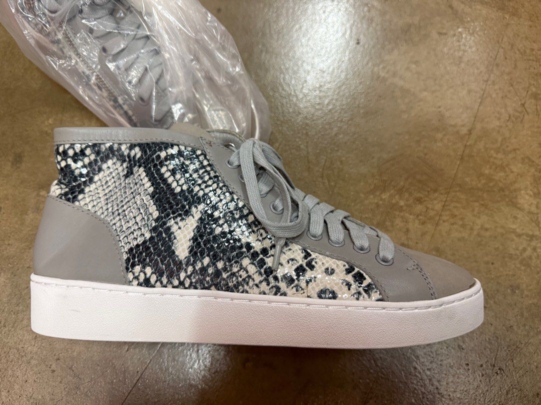 Vionic booties (Category: Boots) located in Singapore. Submitted by kopicoffee (Listing ID 1363774376, Image 2). Description: Brand new snake skin pattern booties with zippers for easy put on and take off. US 7.5. .