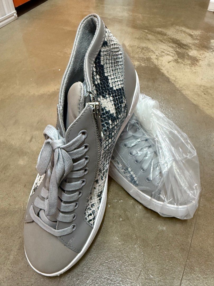 Vionic booties (Category: Boots) located in Singapore. Submitted by kopicoffee (Listing ID 1363774376, Image 1). Description: Brand new snake skin pattern booties with zippers for easy put on and take off. US 7.5. .