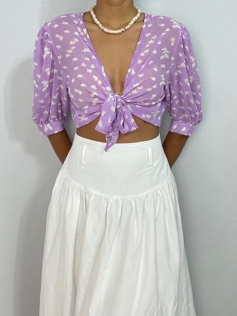Floral see through puffsleeve top (Category: Others Tops) located in Antipolo. Submitted by decluttering.thrifts (Listing ID 1363947368, Image 1). Description: Size: S-M | lavender floral front tie see-through top Bust up to 34”.