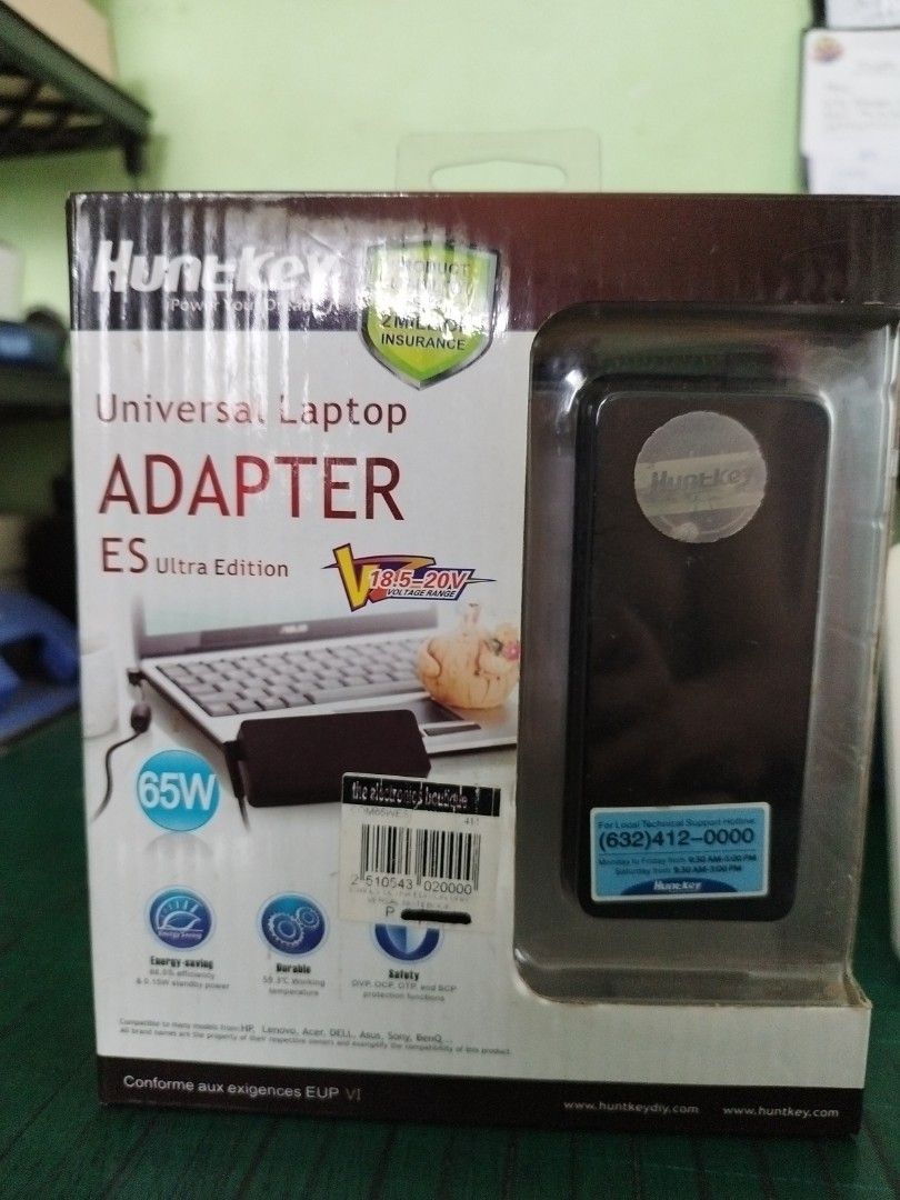 Huntkey Universal Laptop Adapter (Category: Chargers & Cables) located in Imus. Submitted by mytechprime.one (Listing ID 1363910797, Image 1). Description: universal laptop adapter.