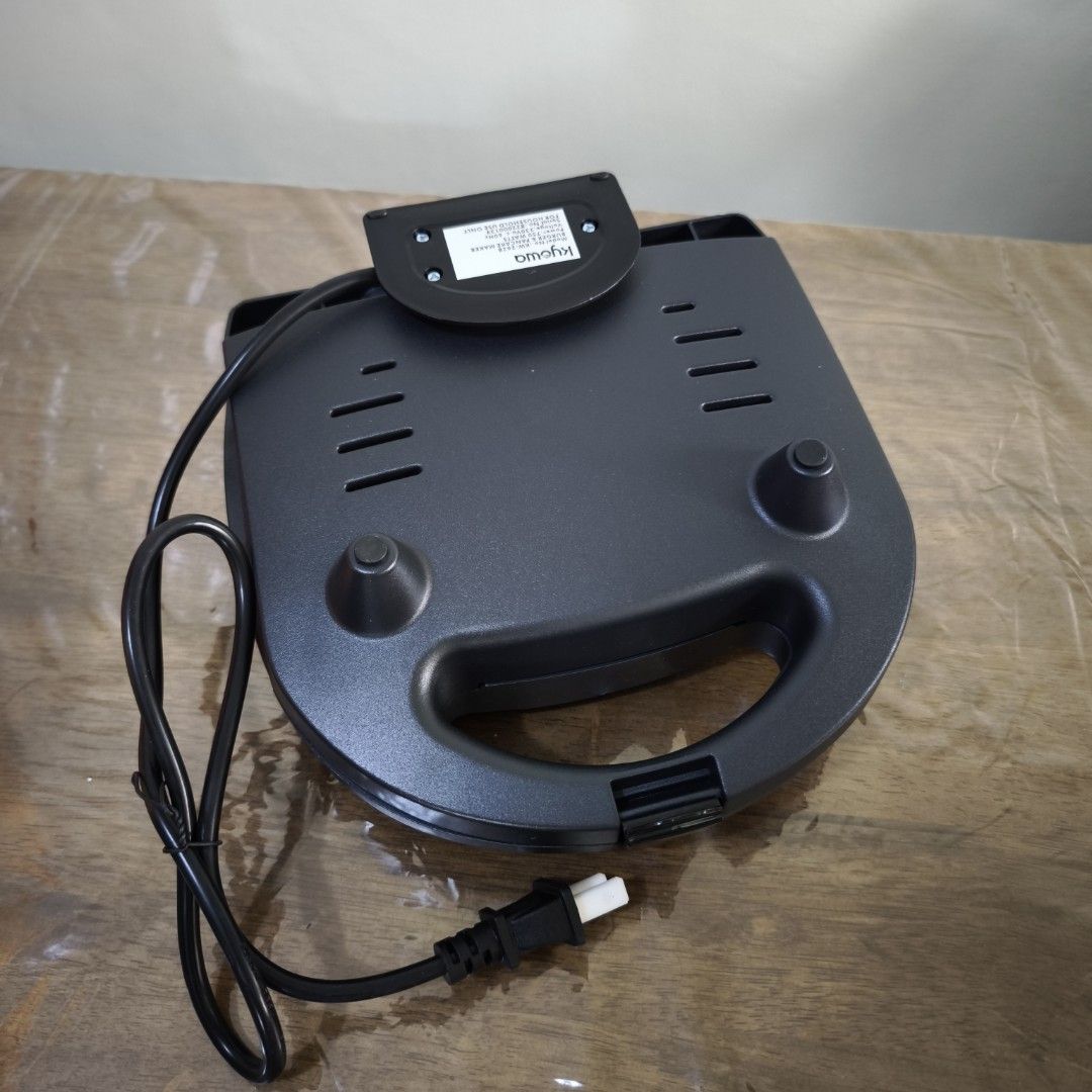 KYOWA Pancake and Burger Maker (Category: Other Kitchen Appliances) located in Manila. Submitted by siopao0130 (Listing ID 1364001917, Image 3). Description: Kyowa Pancake and Burger Maker - original price at Php850 - BRANDNEW BRANDNEW - Power and heat indicator - 2 slots nonstick cooking surface - locking lid for easy storage - prepares 2 pancakes at once - preset temperature - nonstick surface for easy cleaning - Bakelite cool touxh housing - l
