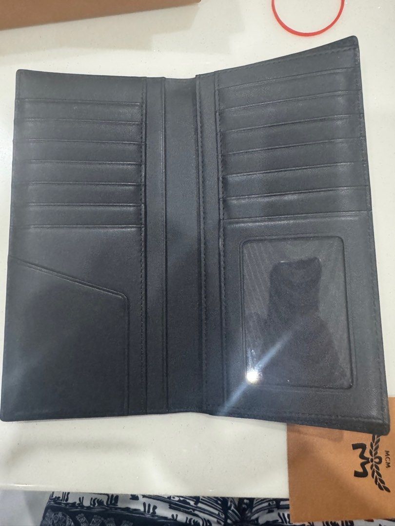 MCM LONG WALLET (Category: Bags & Wallets) located in Singapore. Submitted by daniel.tay.98 (Listing ID 1363992677, Image 1). Description: MCM long wallet Use less then 2 week Tip top condition Selling cos got another one .