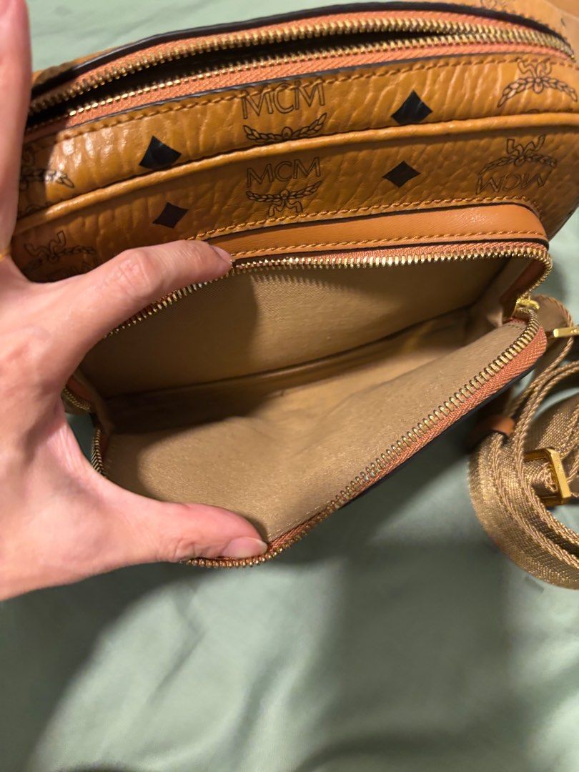 MCM Sling Bag (Category: Bags & Wallets) located in Singapore. Submitted by mehmeh176 (Listing ID 1364018493, Image 3). Description: I got it from another Carousell seller. But didn’t get to use it. I find it too small. Other than the side of the pocket there is a bit of worn out. The bag is in a good condition .
