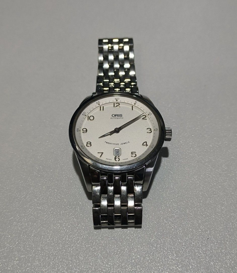 Oris XXL Date Automatic (Category: Men's Watches) located in Taguig. Submitted by j_watches007 (Listing ID 1319710941, Image 2). Description: Authentic Secondhand ⌚ Used Watch Oris XXL Date Automatic White Dial Swiss Made Front Sapphire Crystal All Stainless Steel 20 28540 Oris Swiss 7504 42MM Original Bracelet 7plus inc. wrist size “Watch Only” DISCLAIMER: IT’S OLD USED WATCHES EXPECT OF SOME SCRATCHES/SIGNS OF USAGE & PLEASE MANAGE YOUR EXPECTA