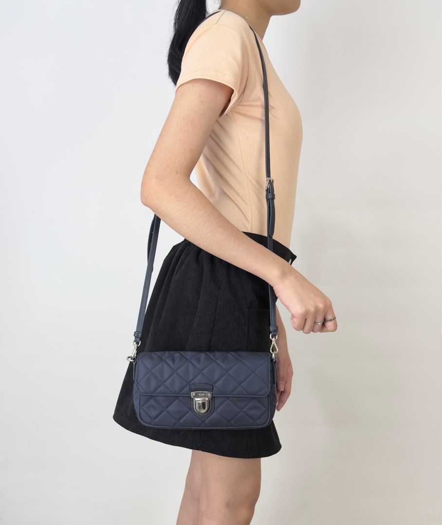 Prada Crossbody (Category: Luxury Bags & Wallets) located in Manila. Submitted by luxuryprelovedbagsby_by_agnes (Listing ID 1363927658, Image 2). Description: P Shoulder Bag BT1025 Navy Nylon Leather Quilted Pochette Crossbody 43k only ! Size (HxWxD) 22.5cm X 13cm x 4.5cm / 5.11’’ x 8.85’’ x 1.77’’ Still in excellent condition Accepting credit card payments Safe and contactless payment up to 36 months! Pay conveniently online . We offer you a saf