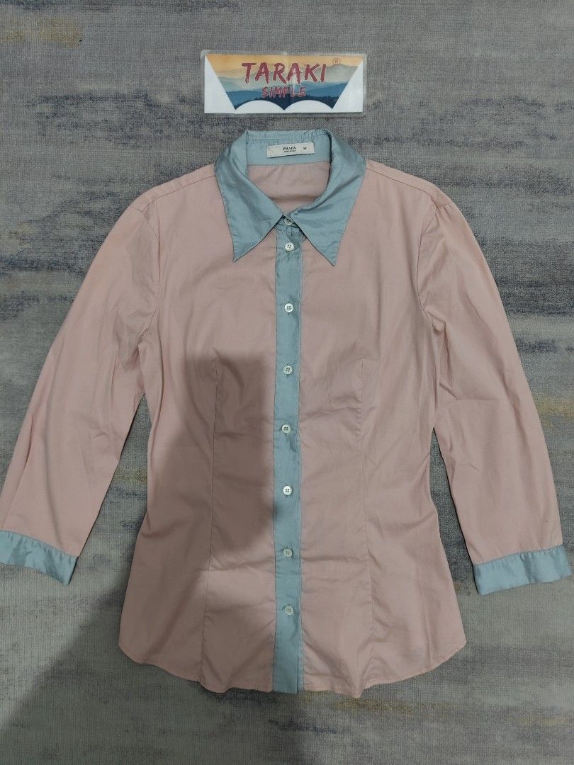 PRADA LONG SLEEVE SHIRT (Category: Luxury Apparel) located in Baguio. Submitted by igorotak.111.taraki.com (Listing ID 1364019196, Image 1). Description: FS PRADA GOOD AS NEW NO ISSUES STRETCH FABRIC GANDA NITO ♥️ L-22 W-16 38 ON TAG CAN FIT XS-SMALL CAN DO.