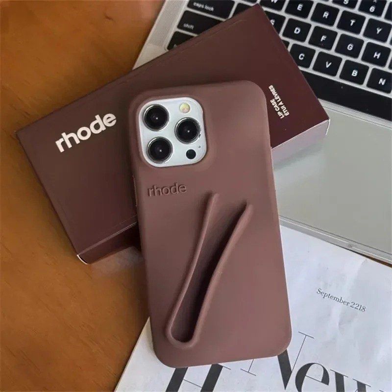 RHODE casing (Category: Cases & Covers) located in Georgetown. Submitted by ntshxrose (Listing ID 1364009495, Image 1). Description: RHODE casing brown iphone 11 pro max just pay for postage.