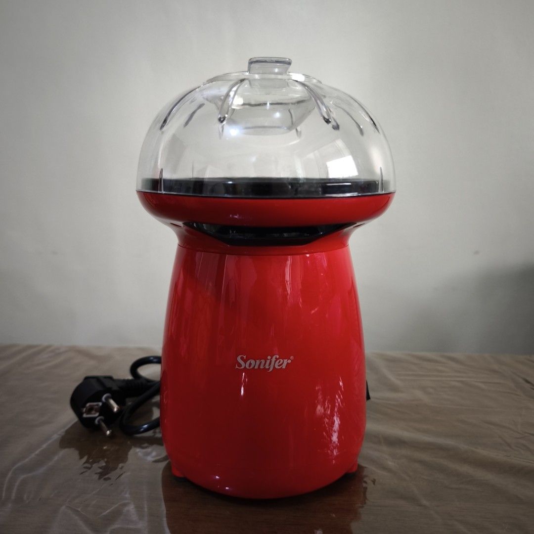 Sonifer Popcorn Maker (Category: Other Kitchen Appliances) located in Manila. Submitted by siopao0130 (Listing ID 1364000329, Image 1). Description: Sonifer Popcorn Maker SF-4014 - Like new, original price bought at Php999 - Simple and convenient way of preparing popcorn at home - Oil free preparation - only takes 2-4 minutes - AC 220-240V 50/60Hz 1200W - low ballers, keep out! Wag naman tumawad ng more than half price, item is like new!.