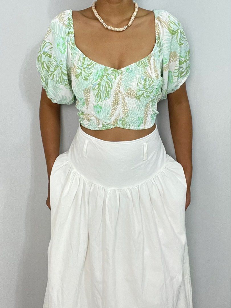 Tropical puffsleeve summer top (Category: Others Tops) located in Antipolo. Submitted by decluttering.thrifts (Listing ID 1363946852, Image 1). Description: Size: S-M | leafy green overlap smocked puff sleeve top Bust up to 38”.