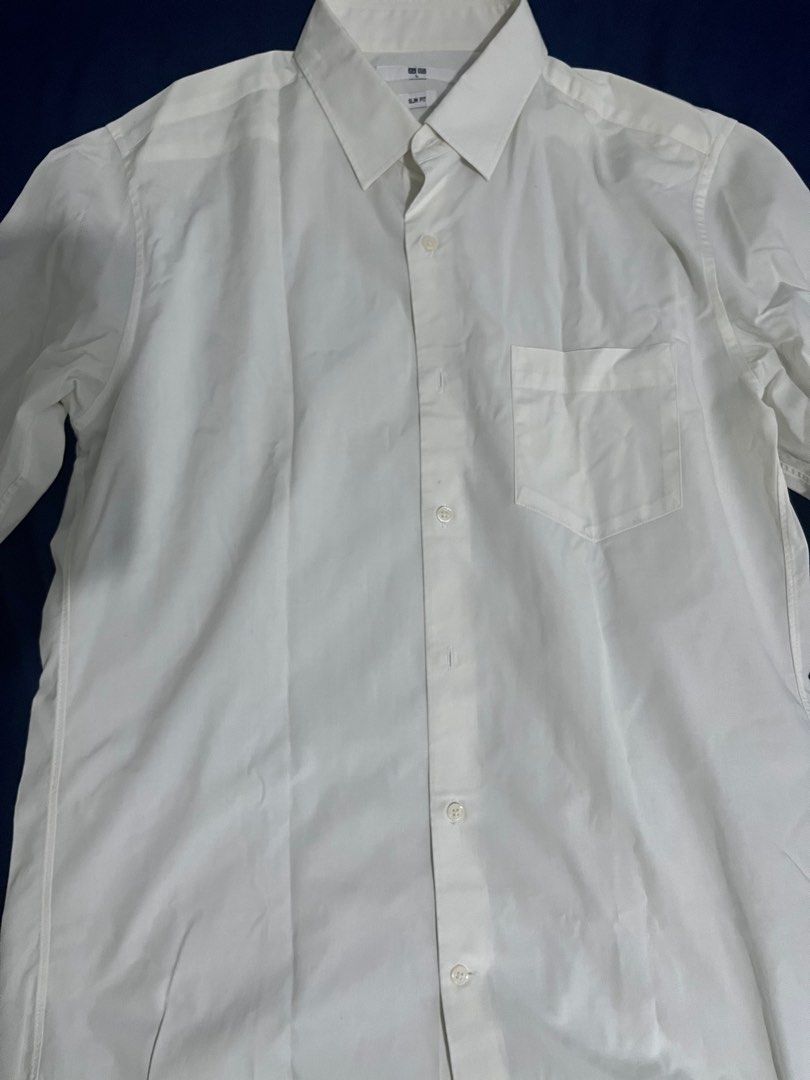Uniqlo white shirt (Category: Formal Shirts) located in Pasig City. Submitted by studenthoarder (Listing ID 1363889531, Image 1). Description: .