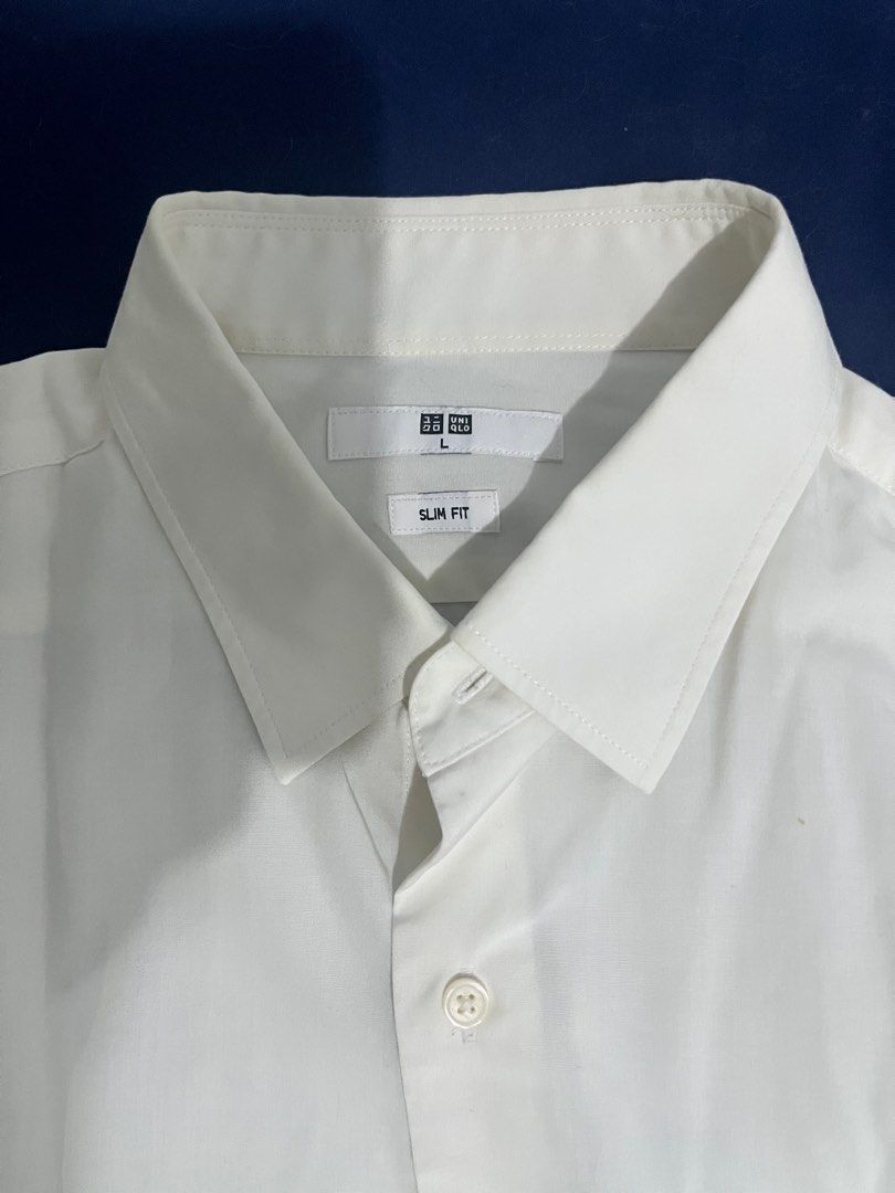 Uniqlo white shirt (Category: Formal Shirts) located in Pasig City. Submitted by studenthoarder (Listing ID 1363889531, Image 2). Description: .